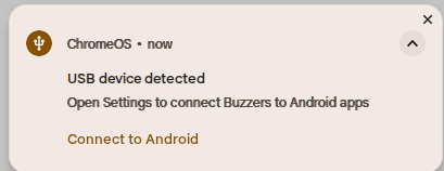 ChromeOS notification saying 'USB device detected. Open Settings to connect Buzzers to Android apps', with a 'Connect to Android' button.